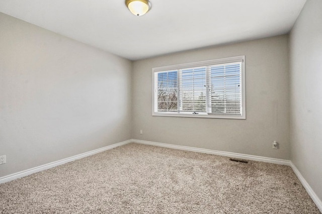 29709 Francesca Ln, Chesterfield, MI 48047 - unfurnished room featuring baseboards, visible vents, and carpet