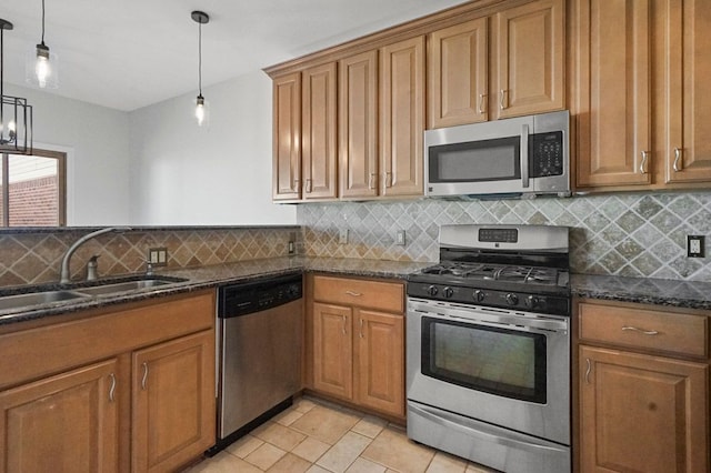 29709 Francesca Ln, Chesterfield, MI 48047 - kitchen featuring brown cabinetry, stainless steel appliances, and a sink