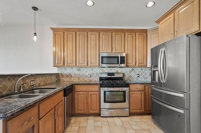 29709 Francesca Ln, Chesterfield, MI 48047 - kitchen with stainless steel appliances, a sink, brown cabinetry, and tasteful backsplash