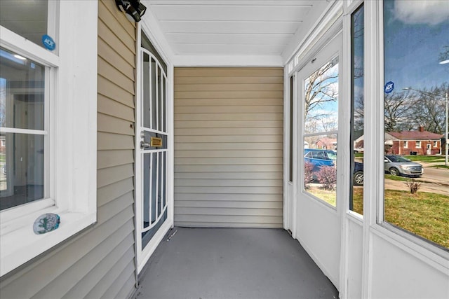 unfurnished sunroom featuring a wealth of natural light