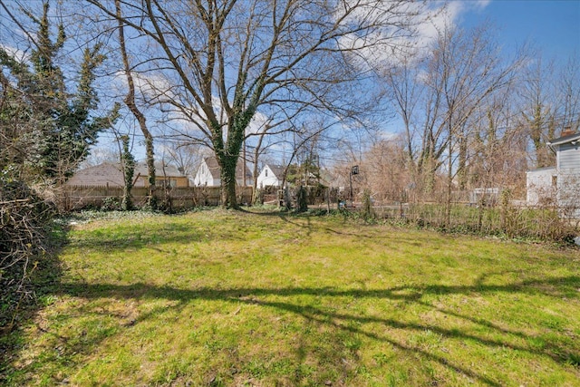 view of yard with fence