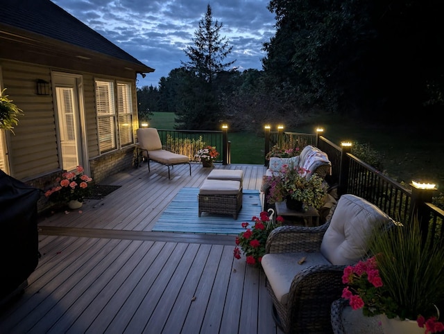 wooden terrace featuring an outdoor living space