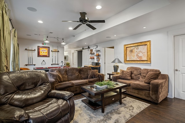 living area with ceiling fan, recessed lighting, a barn door, and dark wood-style floors