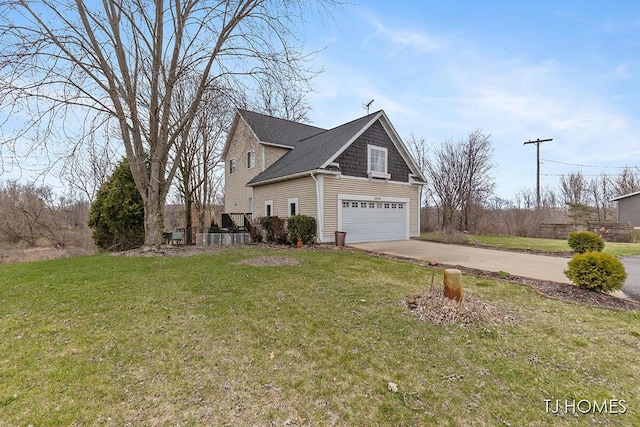 view of side of home featuring a yard, an attached garage, and driveway