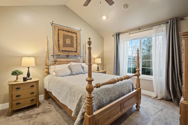 bedroom featuring light carpet, baseboards, a ceiling fan, and lofted ceiling