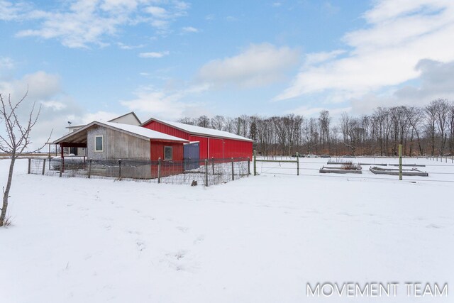 11559 Williams Rd, Montague, MI 49437 - exterior space featuring fence, an outbuilding, and an outdoor structure