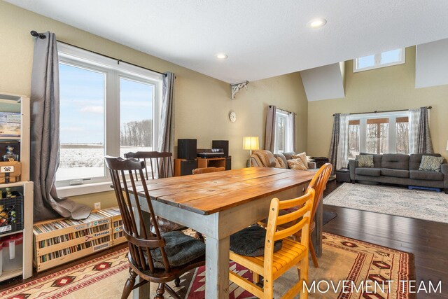 11559 Williams Rd, Montague, MI 49437 - dining area featuring recessed lighting, vaulted ceiling, and wood finished floors