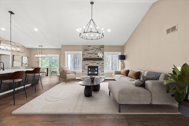4070 Metamora Rdg, Metamora, MI 48455 - living area featuring visible vents, plenty of natural light, and an inviting chandelier