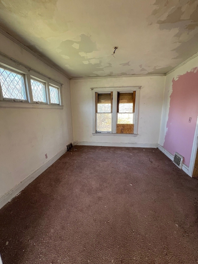 190 W Buena Vista St, Highland Park, MI 48203 - carpeted spare room featuring baseboards and ornamental molding