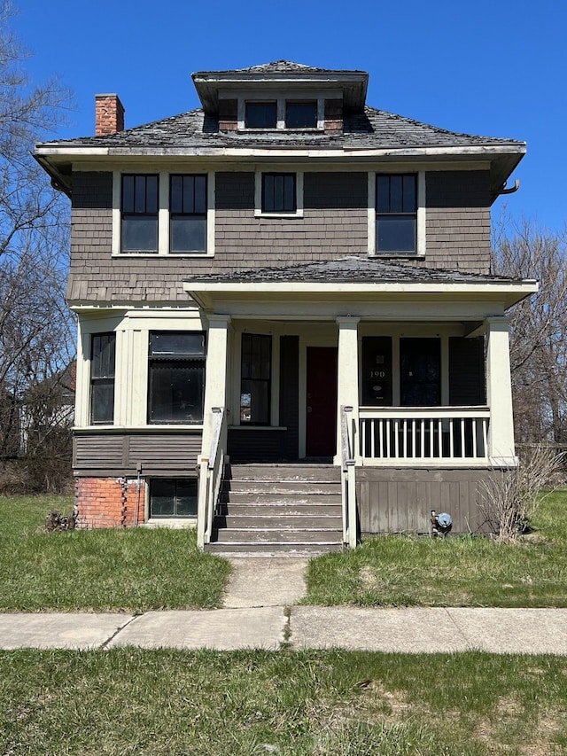 190 W Buena Vista St, Highland Park, MI 48203 - traditional style home featuring a porch and a chimney