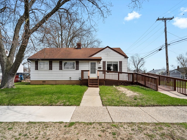 29060 Michigan St, Roseville, MI 48066 - ranch-style house with crawl space, a wooden deck, a chimney, and a front lawn