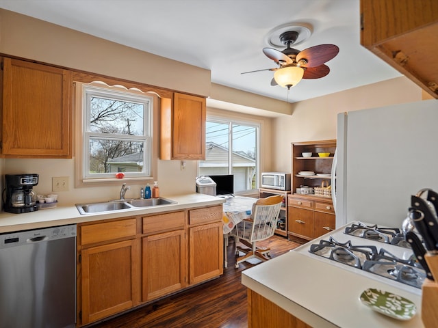 29060 Michigan St, Roseville, MI 48066 - kitchen featuring a sink, light countertops, ceiling fan, dark wood-style floors, and stainless steel appliances
