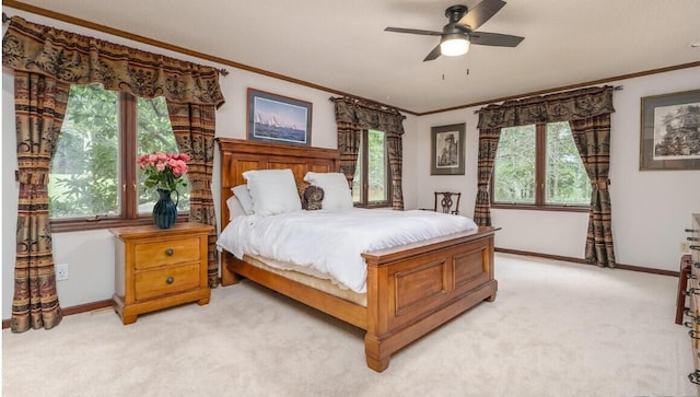 9420 Whim Trl, Richland, MI 49083 - bedroom with baseboards, light colored carpet, multiple windows, and crown molding