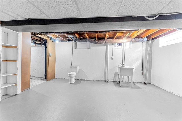 basement featuring a sink