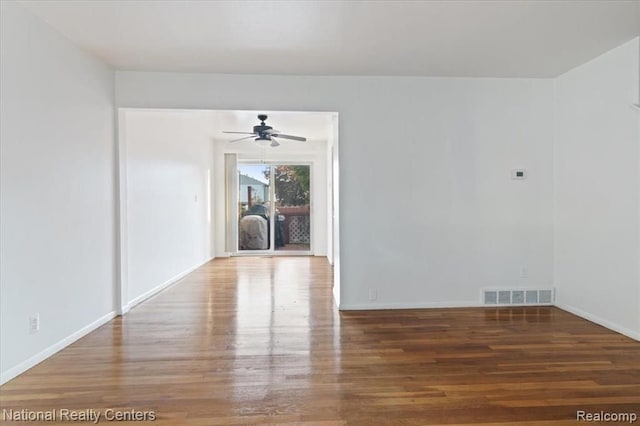 25711 Salem, Roseville, MI 48066 - spare room with wood finished floors, visible vents, a ceiling fan, and baseboards