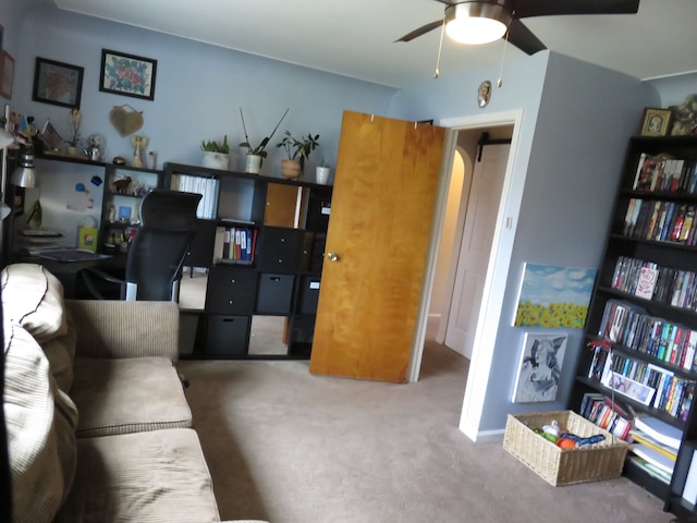 5900 Commerce Rd, West Bloomfield, MI 48324 - interior space featuring arched walkways, a ceiling fan, and carpet floors