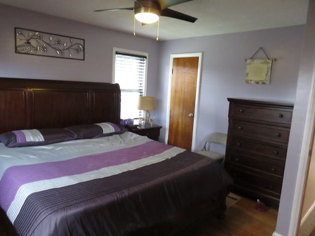 5900 Commerce Rd, West Bloomfield, MI 48324 - bedroom featuring ceiling fan and wood finished floors