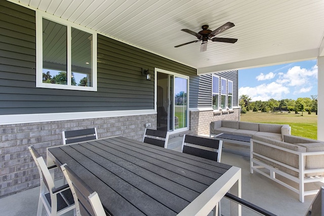 13268 Cousin, Washington, MI 48094 - view of patio with outdoor dining space, ceiling fan, and an outdoor hangout area