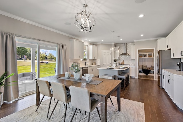 13268 Cousin, Washington, MI 48094 - dining area with dark wood-type flooring, ornamental molding, and an inviting chandelier