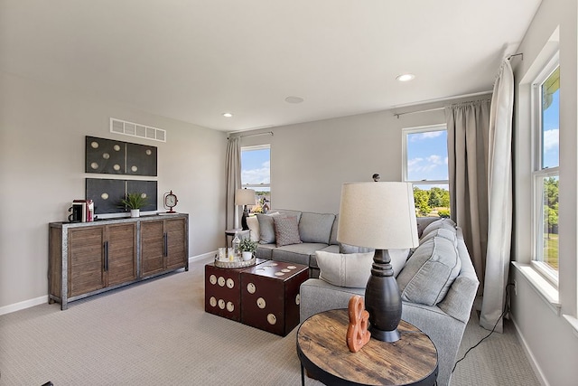 13268 Cousin, Washington, MI 48094 - living area featuring light colored carpet, baseboards, visible vents, and recessed lighting