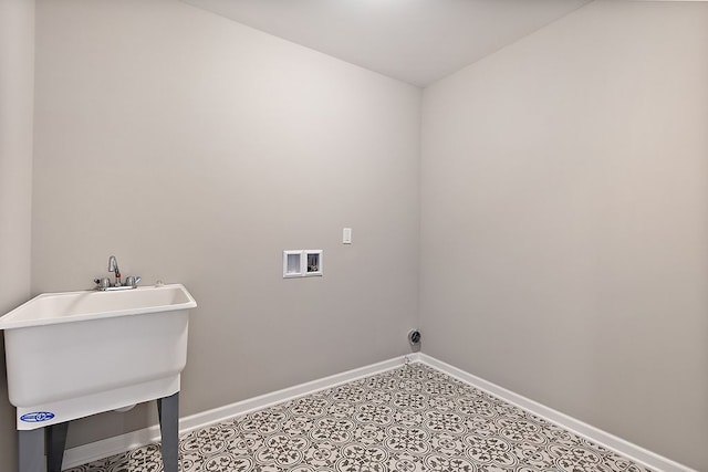 13268 Cousin, Washington, MI 48094 - laundry area featuring a sink, baseboards, laundry area, and washer hookup