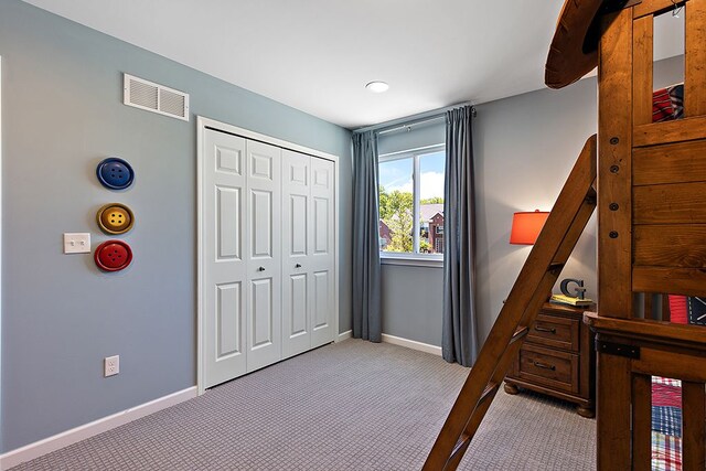 13268 Cousin, Washington, MI 48094 - bedroom with visible vents, a closet, baseboards, and carpet floors