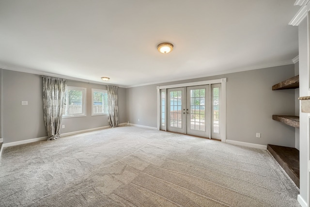3015 N Wilson Ave, Royal Oak, MI 48073 - unfurnished living room featuring ornamental molding, carpet flooring, and french doors