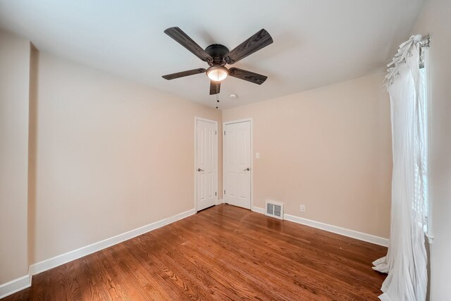 3015 N Wilson Ave, Royal Oak, MI 48073 - empty room featuring baseboards, a ceiling fan, visible vents, and wood finished floors