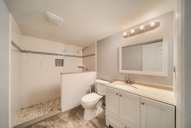 3015 N Wilson Ave, Royal Oak, MI 48073 - bathroom with vanity, toilet, and a tile shower