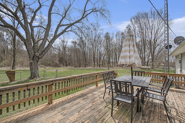 deck featuring fence and outdoor dining area