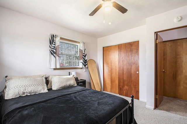 bedroom featuring a closet, ceiling fan, and carpet flooring