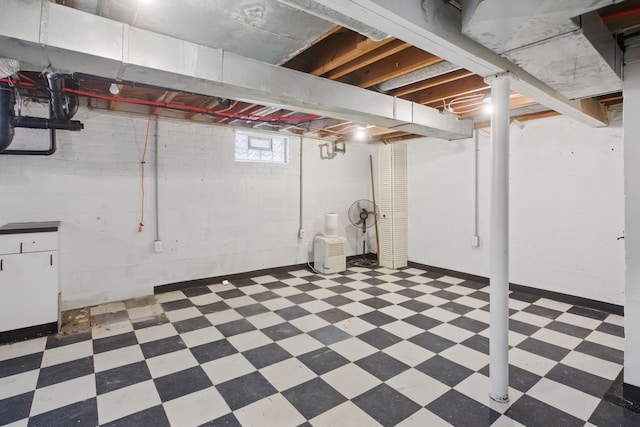 below grade area with tile patterned floors