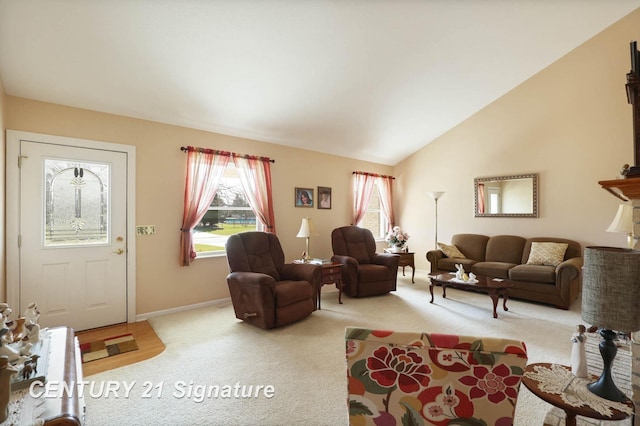 living area with baseboards, carpet, and lofted ceiling
