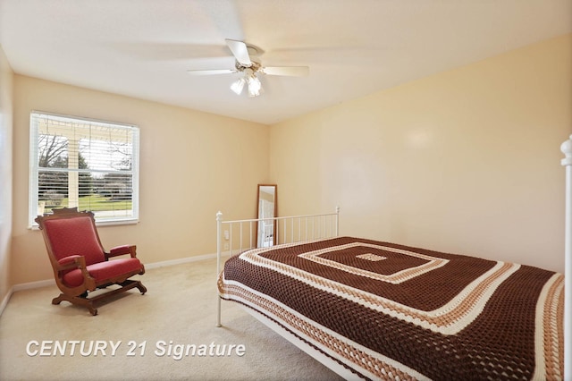 bedroom featuring ceiling fan, baseboards, and carpet floors