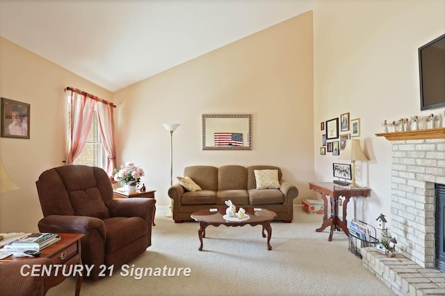 living area featuring a fireplace, vaulted ceiling, and carpet floors