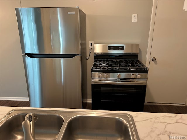 23646 Stonehenge Blvd, Novi, MI 48375 - kitchen featuring appliances with stainless steel finishes and a sink