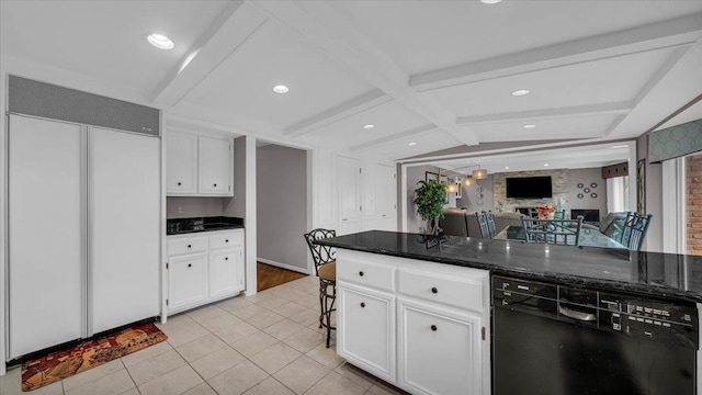 kitchen featuring white cabinets, dishwasher, and paneled fridge