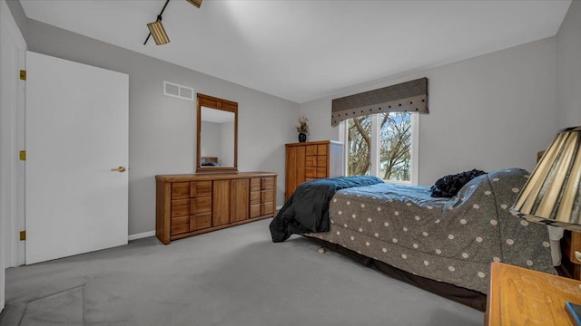carpeted bedroom with visible vents
