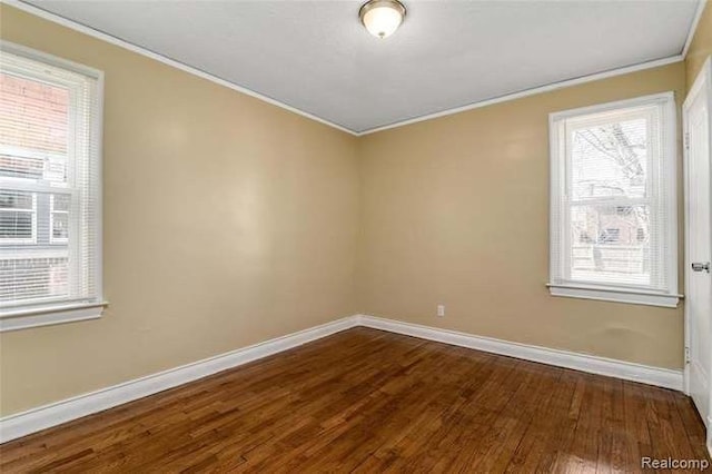6127 Grayton St, Detroit, MI 48224 - unfurnished room with dark wood-style flooring, baseboards, and crown molding