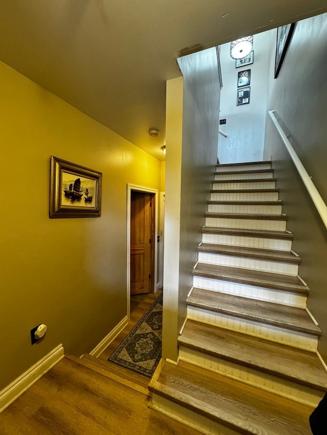 207 Legato Dr, Walled Lake, MI 48390 - stairs with wood finished floors and baseboards