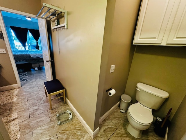 207 Legato Dr, Walled Lake, MI 48390 - ensuite bathroom with toilet and baseboards