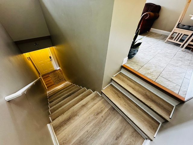 207 Legato Dr, Walled Lake, MI 48390 - stairway with baseboards