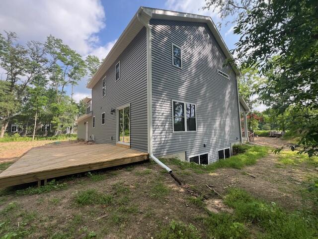 2035 Dakota Trl, Hastings, MI 49058 - rear view of house with a deck