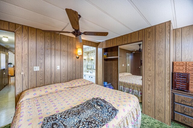 6313 Fairlane Dr, Lake City, MI 49651 - bedroom with wood walls and a ceiling fan