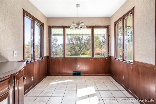 1220 W Green St, Hastings, MI 49058 - unfurnished sunroom featuring a notable chandelier, visible vents, and french doors