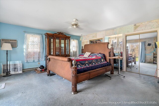 1220 W Green St, Hastings, MI 49058 - bedroom featuring a baseboard radiator, a wall mounted AC, a ceiling fan, and carpet