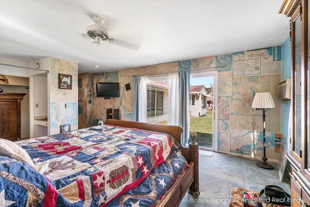 1220 W Green St, Hastings, MI 49058 - carpeted bedroom featuring access to exterior and ceiling fan