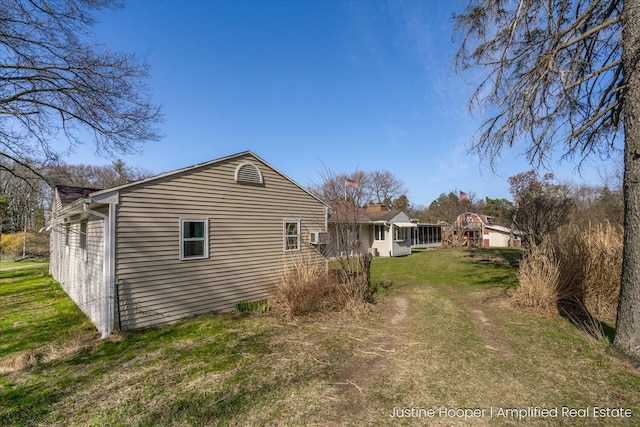 1220 W Green St, Hastings, MI 49058 - view of property exterior featuring a chimney and a lawn