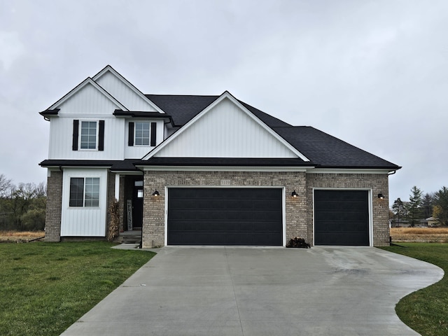 view of front facade featuring concrete driveway, a front yard, board and batten siding, and a garage