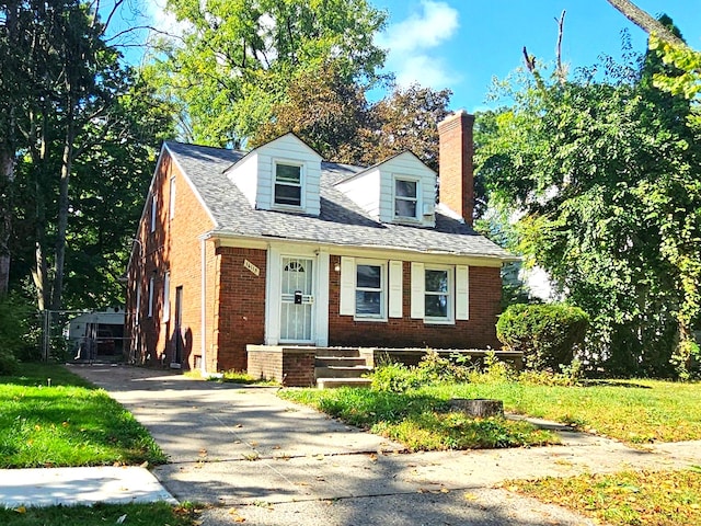 16115 Westbrook St, Detroit, MI 48219 - cape cod home featuring a chimney and brick siding